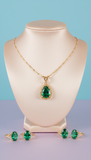 Emerald pendant necklace on gold chain